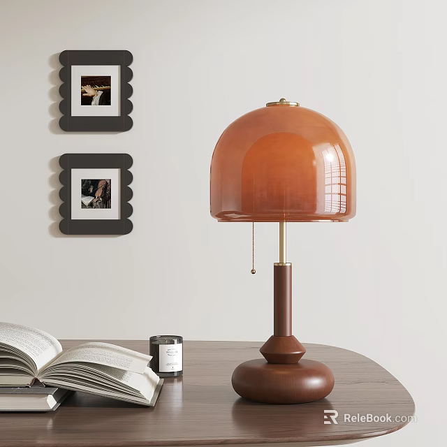 Table Lamp With Wooden Base Orange Glass Shade Near Open Book Jar And Framed 3d model 