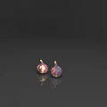 Two Fresh Juicy Striped Purple and Yellow Figs on Black Background