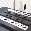Modern Sleek Black And White Switch Panels With Multiple Buttons And Socket Outlets