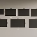 Different Size Televisions Display With Various Screen Sizes Arranged On Wall