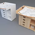 Wooden and White Baby Crib with Storage Drawers and Patterned Mattress