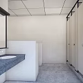 Public Toilet With Light Colored Stalls Black Frames And Modern Clean Design