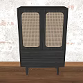 Black Entryway Console Cabinet With Woven Doors And Drawers Against Textured Wall On Wooden Floor