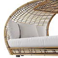 Woven Rattan Double Bed with Curved Frame and White Cushions and Pillows