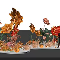 Stunning Floral Installation with Large Orange Red Blooms and People Standing Nearby