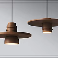 Two Modern Wooden Pendant Lights With Layered Disc Shades And Illuminated Design