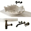 Petal Shaped Above Counter Bathroom Sink With Light Colored Countertop And Vintage Brass Faucet