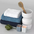Stylish Bathroom Accessories With Stacked Towels Wooden Hairbrush White Container Small Candles And Decorative Artichoke