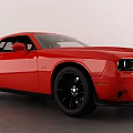 Red Dodge Challenger Two Door Sports Car With Black Wheels And Sporty Design