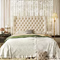 Elegant Double Bed With Beige Tufted Headboard White Bedspread And Green Blanket