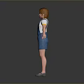 Child with Red Hair Wearing Blue Overalls Shorts and White T-shirt Standing with Arms Outstretched