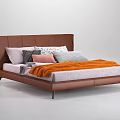 Modern Leather Double Bed With Brown Headboard Pillows And Orange Blanket 3d model