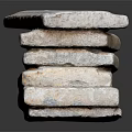 Neatly Stacked Bricks with Textured Surfaces on Dark Reflective Background
