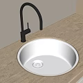 Modern Stainless Steel Kitchen Sink With Black Faucet On Light Countertop