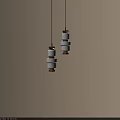 Two Pendant Lights With Golden Metal Frames And White Square Shades On Light Colored Wall