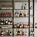 Various Wine Bottles And Glasses Neatly Arranged On Modern Multi Layer Shelves
