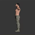 Shirtless Man With Camouflage Pants And Boots Standing With Arms Outstretched Against Gray Background