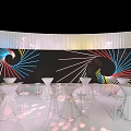 Modern Banquet Hall With White Round Bar Tables And Colorful Radial Pattern Backdrop