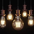 Vintage Pendant Lights With Brown Base And Transparent Bulbs In Various Sizes On Black Background