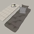 Soft Upholstered Cushions In Beige And Brown With Checkered Pillow And Stacked Books