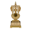Ornate Classical Gold Clock With Round Dial Winged Angel Figures And Carved Base