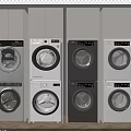 Four White And Black Front Loading Washing Machines Displayed Side By Side 3d model