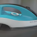 Modern Electric Iron in Blue and White Design with Sleek Handle for Daily Household Use