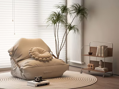 Beige Bean Bag Chair with Round Woven Rug Books Camera Potted Palm and Metal Cart 3d model