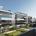 Modern Apartment Building Exterior Design With Green Courtyard And Glass Balconies