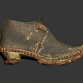 Vintage Leather Shoe With Worn Texture And Colorful Edge Decorations