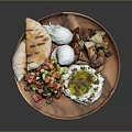 Delicious Mediterranean Food Platter with Pita Bread Tomato Cucumber Salad Boiled Eggs Roasted Potatoes and Yogurt Dip