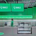 Modern Fitness Space With SHAKE IT Counter Green Accents And Gray Interior Plants