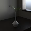 White Minimalist Vase Holding Green Leaves On Dark Wooden Table With Natural Light From Window