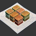 Layered Square Pastries with Golden Crust and Red White Layers on White Square Plate