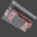 Small Red Car Covered with Various Stickers All Over the Body
