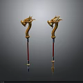 Two Ornate Dragon Head Staff Weapons With Gold Red Metal Decorative Design