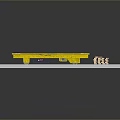 Yellow Industrial Mechanical Device on Track with Wooden Boards and Concrete Floor