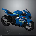 Blue Suzuki Sporty Motorcycle With Streamlined Body Green Red Stripes And Black Wheels