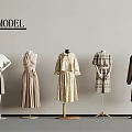 Clothes Display On Mannequins With Various Fashionable Styles And Plaid Designs