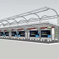 Modern Station With Illuminated White Roof Structure And Blue Billboards At Night