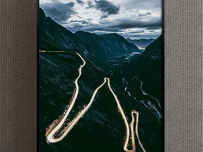 Scenic Mountain Landscape With Winding Roads Light Trails And Dark Cloudy Sky 3d model