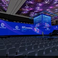 Modern Conference Stage Design With Blue Lighting Large Screens And Arranged Seats Setup