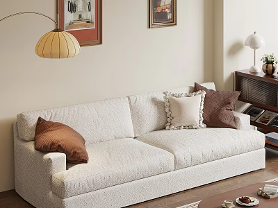 Light Colored Sofa With Brown Decorative Pillows And Coffee Table Near Bookshelf And Wall Art 3d model