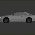 Silver Two Door Sports Car With Rear Spoiler And Sleek Modern Exterior