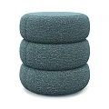 Three Round Dark Green Woven Ottoman Poufs Stacked For Stylish Seating Decor