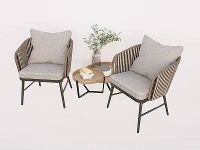 Wicker Chair and Table Set with Gray Cushions Small Round Table Green Plant and Books 3d model