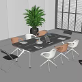 Modern Glass Top Conference Table With Colorful Chairs And Green Plant In Bright Office