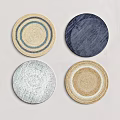 Four Stylish Round Rugs With Different Woven Patterns And Neutral Blue Tones