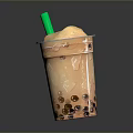 Creamy Bubble Tea With Tapioca Pearls In Transparent Cup And Green Straw