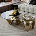 Elegant Modern Coffee Table With Glass Top And Golden Geometric Legs Design
